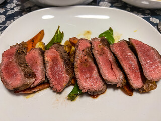 Close-up of seafood, meat and food on dinner plate