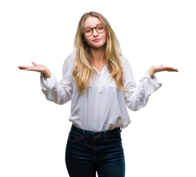 Young beautiful blonde business woman wearing glasses over isolated background clueless and confused expression with arms and hands raised. Doubt concept.