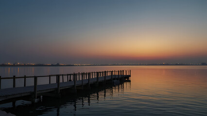 Fototapeta premium Morning View Before Sunrise at Moden Lake, Dammam, Saudi Arabia: Serene and Tranquil Landscape.