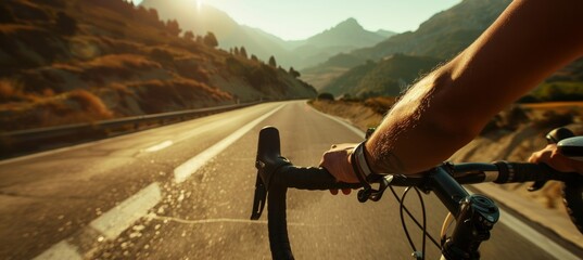 Disabled Cyclist Adjusting Prosthetic Arm on Bike Handlebar with Scenic Mountain Road