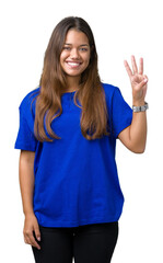 Young beautiful brunette woman wearing blue t-shirt over isolated background showing and pointing up with fingers number three while smiling confident and happy.