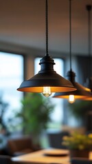 Obraz premium A stylish pendant lamp glows warmly, enhancing the ambiance of a contemporary dining area filled with plants at dusk