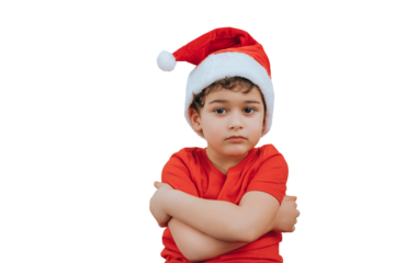 young boy wearing a Santa hat and red shirt crosses his arms, appearing upset or pensive. The transparent background makes it versatile for various design uses