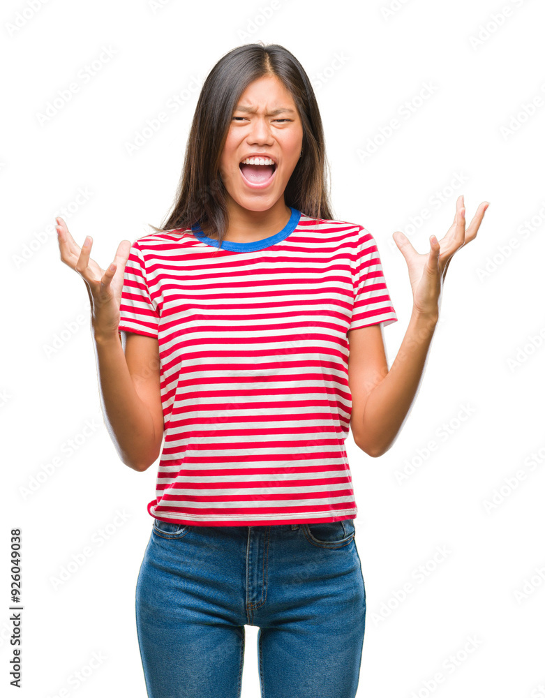 Canvas Prints Young asian woman over isolated background crazy and mad shouting and yelling with aggressive expression and arms raised. Frustration concept.