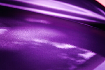 A purple background with a white line in the middle