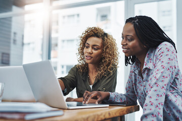 African women, laptop and mentor help for small business, research or creative startup for online...
