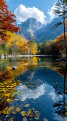 Tranquil Mountain Pond Reflecting Autumn s Vibrant Foliage in a Serene Natural Landscape
