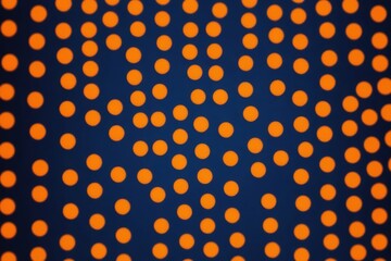 Abstract blurred background of orange spots stripes on a dark blue background