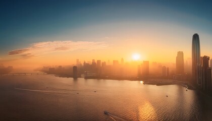 Fototapeta premium View of a big city with many tall buildings at morning sunrise.