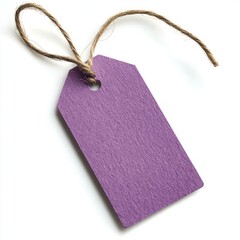 Close up of Purple Craft paper tag with twine on an isolated white background