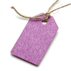 Close up of Purple Craft paper tag with twine on an isolated white background