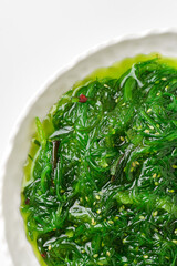 chuka salad in a white plate