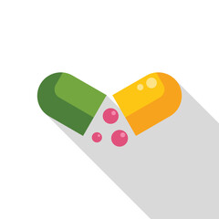Green and yellow pill capsule opening and releasing tiny pink beads, in a flat design style