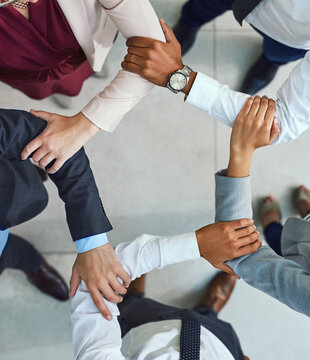 Business team, hands and collaboration together in pentagon shape from above. Corporate teamwork, support and trust for hope, motivation and success working in office with commitment and union care