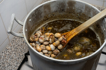 A traditional Portuguese tavern kitchen with a pot of 