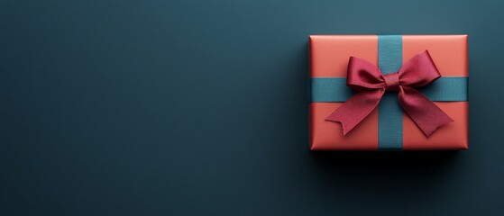 Festively Wrapped Gift Box with Elegant Bow for Special Occasions, Copy Space Available