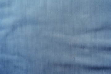 Fototapeta premium Processed collage of folded denims jean blue fabric texture. Background for banner, backdrop