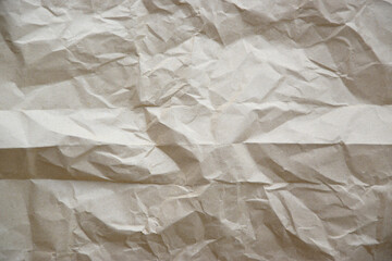 Brown background of paper texture or cardboard surface from a paper box There are wrinkles from the impact. Surface of the parcel box is wrinkled with Transport