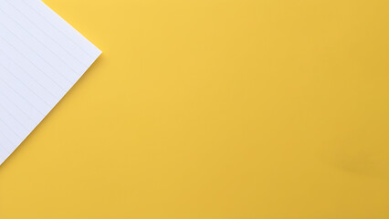 Flat lay paper notebook on yellow background, workspace concept. Top view, banner, with copy space