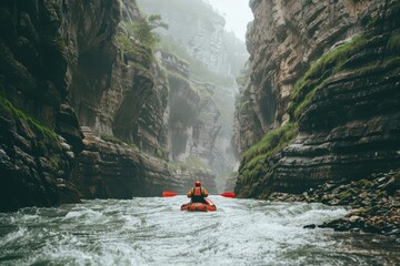 Kayaking through a misty canyon.