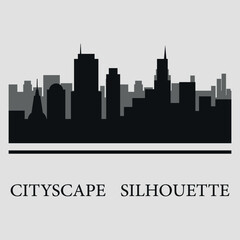 Naklejka premium The city skyline. Silhouettes of buildings. Vector on a gray background 