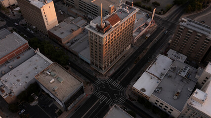 Fresno, California, USA - April 18, 2023: Sunset light shines on the historic downtown Fresno...