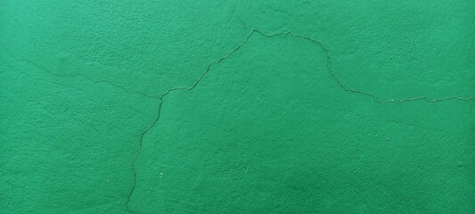 cracked green walls. for the background of house damage