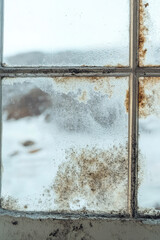 Extensive mold growth on window and slopes, mildew on window, damp, fungus