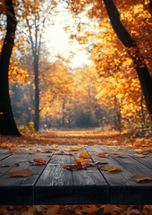 Sunlit table with autumn trees and fallen leaves in the background, ideal for product displays or presentations.