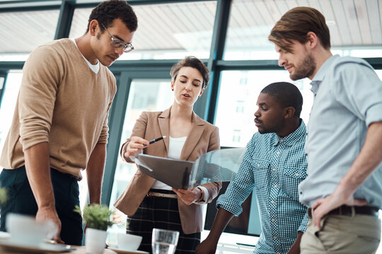 Creative, business people and discussion with file in office for project funding, financial reporting and cost analysis. Finance team, communication and documents for expense management and planning.