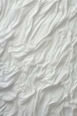 Fototapeta premium White wrinkled fabric background texture.