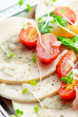 A plate of food with a variety of vegetables and meat