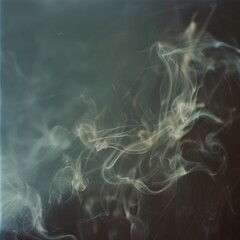 Fototapeta premium Wisps of smoke create delicate patterns against a gradient backdrop, evoking a sense of calm and mystery.