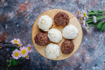 Delicious homemade meringue cookies with coconut flakes.