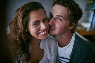 Selfie, house and couple with love, kiss and happiness with romance, relationship and moment. Anniversary, face and man with woman, apartment and capture with picture, care and kindness with smile