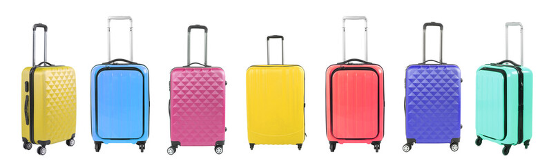 Stylish suitcases of different colors on white background, set