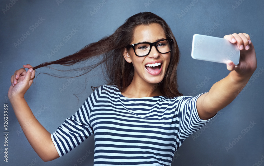 Sticker Female person, glasses and selfie with smile, optometry and confidence on gray studio background. Woman, memory and happy for eyewear, social media and eye care with post, clear vision and frame lens