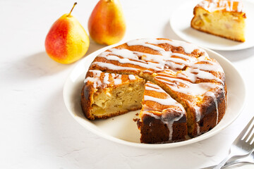 Pear pie. Homemade cake. Fruit dessert on a plate. 