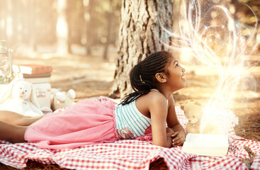 Happy girl, picnic and forest with book for fairytale, wish or magical moment in nature. Young...