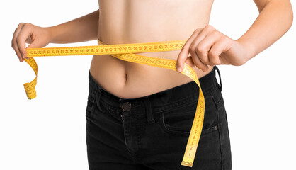 woman measuring their waist