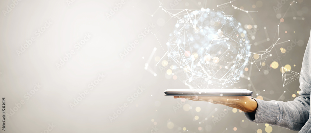 Poster Hand holding tablet with holographic digital sphere, representing data networking and global information exchange concept.