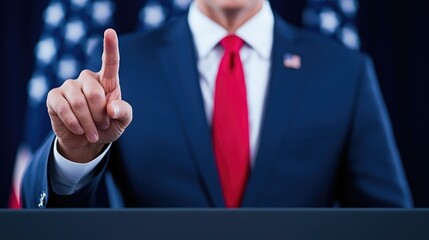A confident speaker gestures with a finger raised, symbolizing authority and focus, against the backdrop of a national flag.