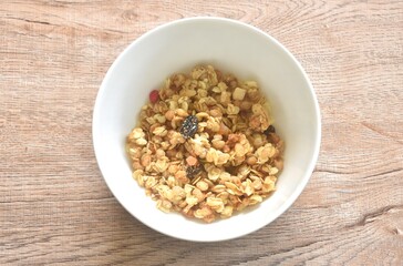 fruit granola dry cereal breakfast eat with fresh milk on bowl