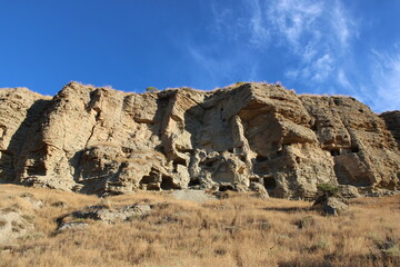 Caves in the Risco de las Cuevas, Perales de Tajuña, Spain, ancient dwellings and storage spaces from the Roman and Medieval periods carved into the earth