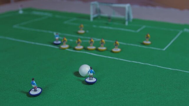 playing  classic table football game 4k