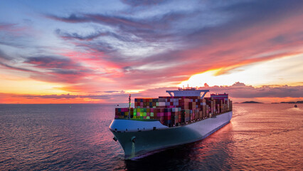 Cargo Container Ship at sunset in the ocean ship carrying container and running for export concept...