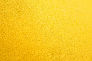  golden yellow paper background texture of bright yellow wallpaper, for design element, website banner background. AI generation.