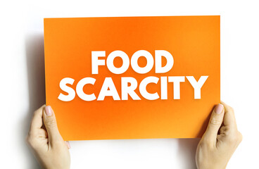 Food scarcity - lack of consistent access to enough food for every person in a household, text concept on card