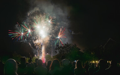 Fireworks. 
Group of people watching the fireworks.
French National Day in Soissons