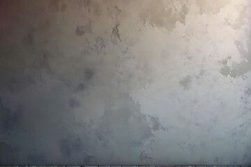 Obraz premium A close-up shot of a rough, textured grey wall with subtle light reflections.